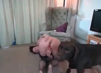 Sexy owner and a very playful doggy